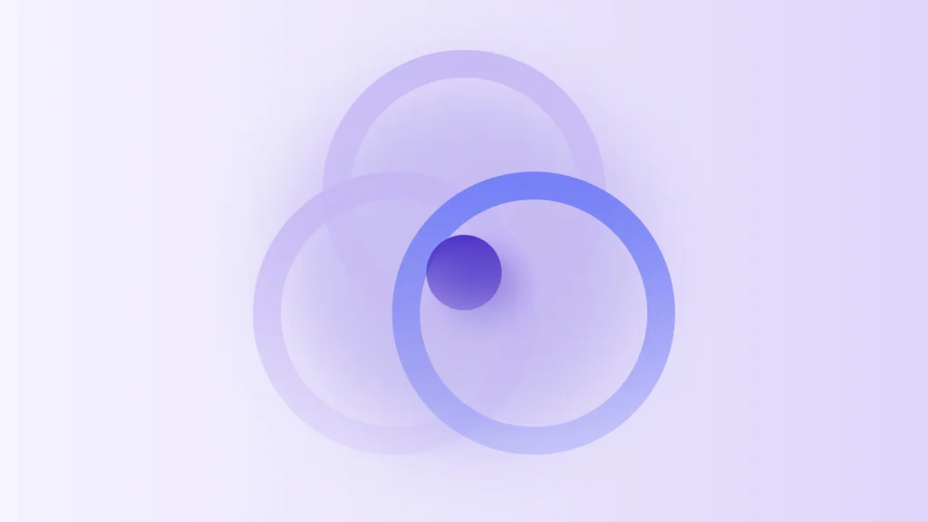 Three overlapping lavender rings arranged in a triangle, with a deep purple disc at their shared center